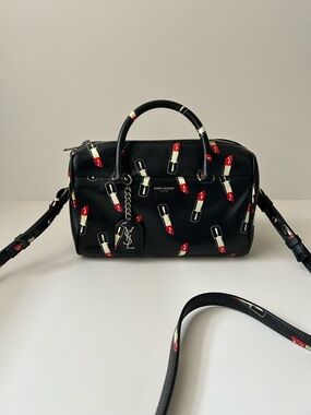 Saint Laurent Black Leather Satchel with Red Lipstick Print